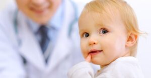 A baby with hand, foot, and mouth disease