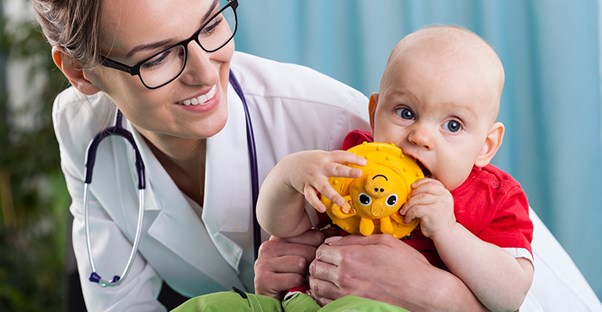 A doctor with a hand foot and mouth patient
