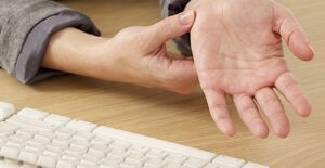 person with nerve pain in wrist