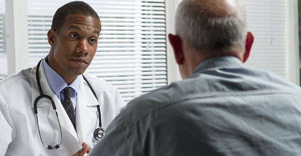 doctor giving cirrhosis prognosis