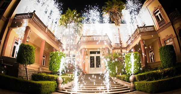 Lights illuminate a historic building in Coyoacan Mexico City.