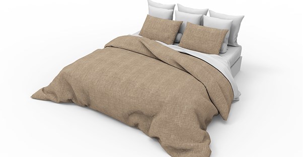 made up bed in white room