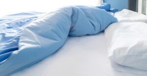 unmade bed from bedwetting