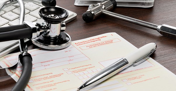 doctors desk examining risks of medically induced coma