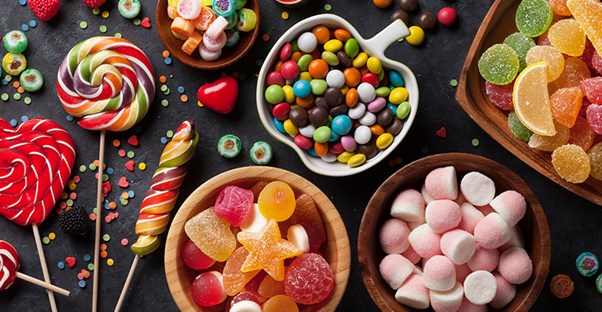 sweets on a table causing gingivitis