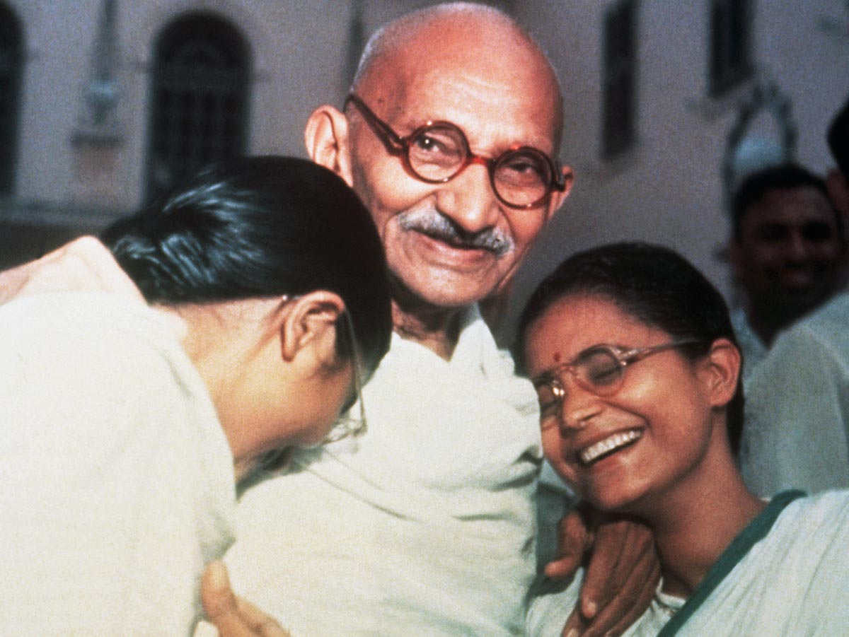 Mahatma Gandhi Laughing with Granddaughters