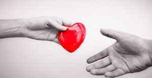 understanding mitral valve prolapse by handing a red heart to each other