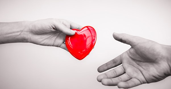 understanding mitral valve prolapse by handing a red heart to each other