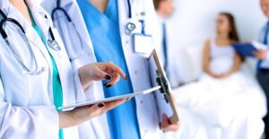 two doctors discussing mitral valve prolapse treatments
