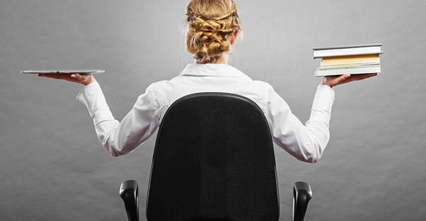 Woman weighs her options of online learning vs traditional