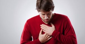 guy experiencing severe cough symptoms