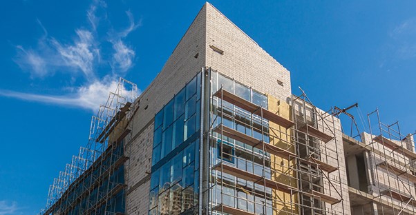 a construction team working on a sustainable business building
