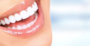 woman who is happy because she successfully treated her bruxism
