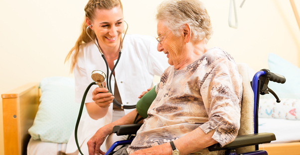 Doctor helping patient because of the Affordable Care Act