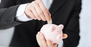Person saving up to pay off their student loans