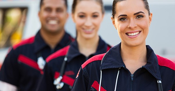 EMTs smile proudly after a job well done