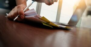 A social worker goes over some paperwork