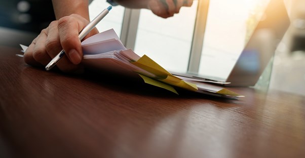 A social worker goes over some paperwork