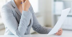 woman learning the difference between articles of incorporation and organization