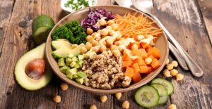 Mixed bowl of animal-friendly food. Vegan vs vegetarian.