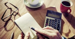 Notepad, calculator, coffee. Tops schools for actuarial science.