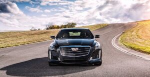 Cadillac driving on an open road. Best Cadillac models of 2017.