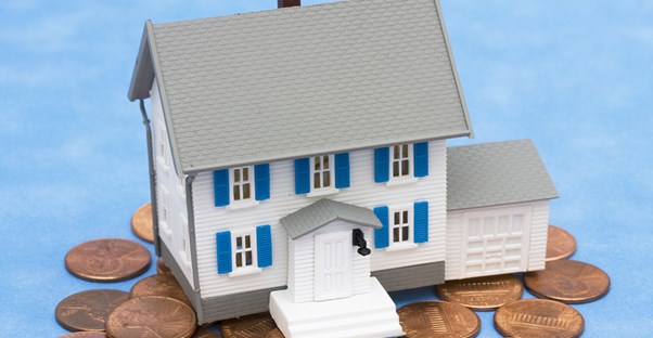 House on a stack of pennies