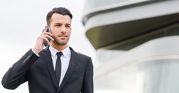 man on cell phone. should you have a second phone for work.