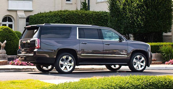 A dark 2017 GMC Yukon in a driveway