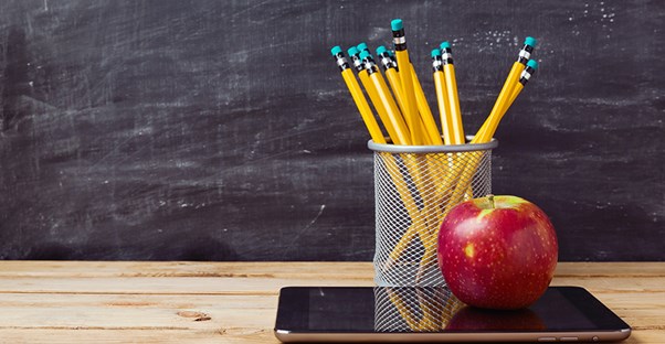online summer school classes. chalkboard and apple.