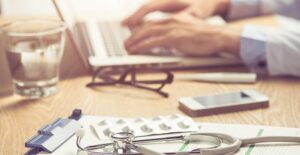 doctor desk. stomach cancer treatments