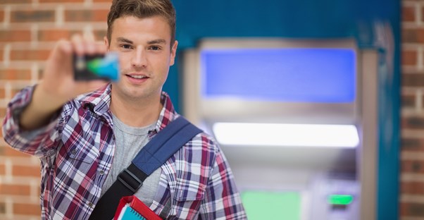 student using a credit card