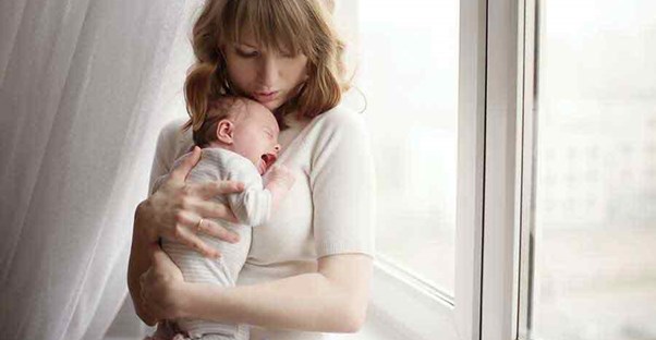woman soothing baby
