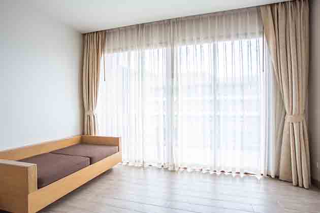 Do: Hang Curtains High and Wide