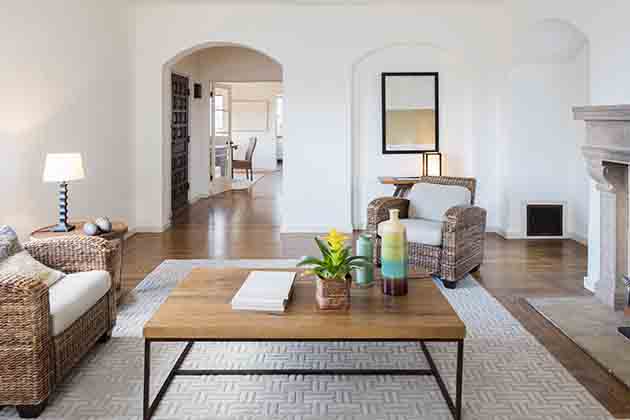 Do: Use Large Floating Rugs