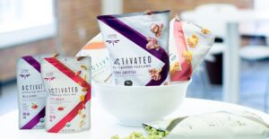 living intentions popcorn and sprouted trail mix in a bowl