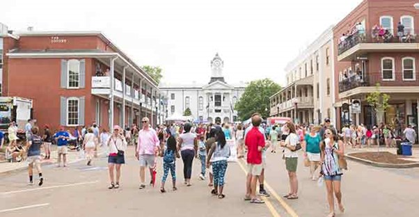 a crowd of people in the oxford mississippi square