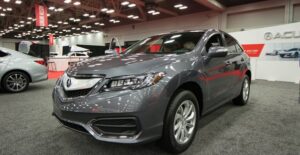 a grey 2019 acura rdx at an auto show