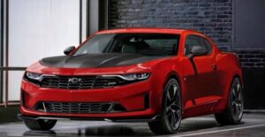 a red 2019 chevrolet camaro in a garage