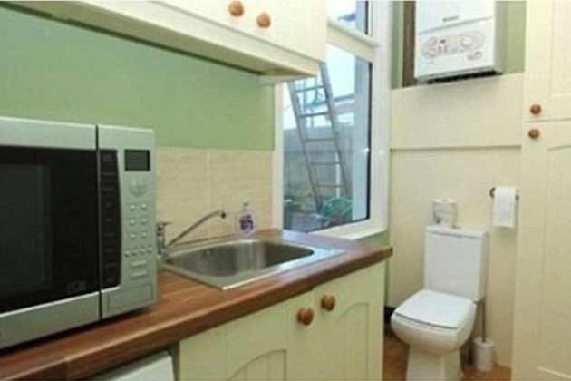 Behold, the kitchen-bathroom combo!