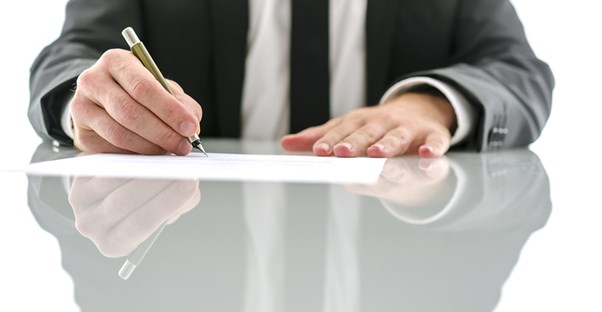 Divorce lawyer drawing up paperwork