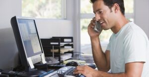 Man working from home and filing his taxes