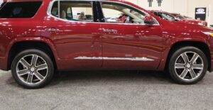 a red 2019 gmc acadia