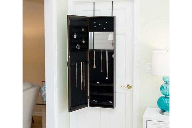 Store jewelry in a door mirror.