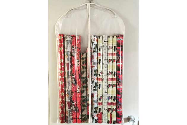 Store wrapping paper in a garment bag.