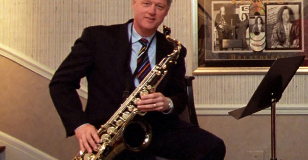 Bill Clinton playing the saxophone