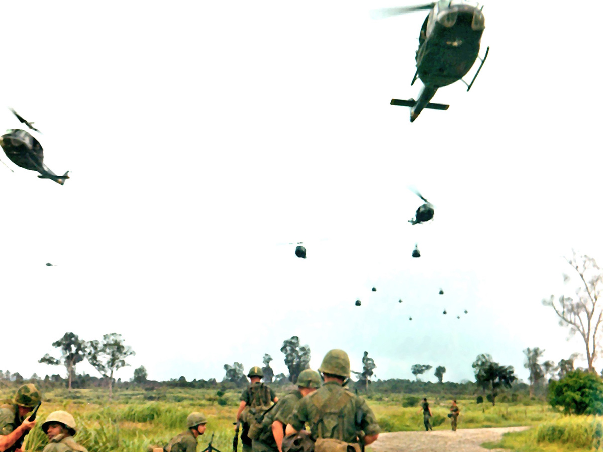Helicopters Fly Over Soldiers in War Zone D