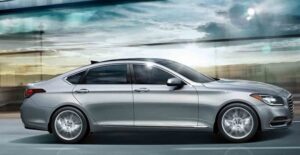 a silver 2019 genesis g80 zooming down the road