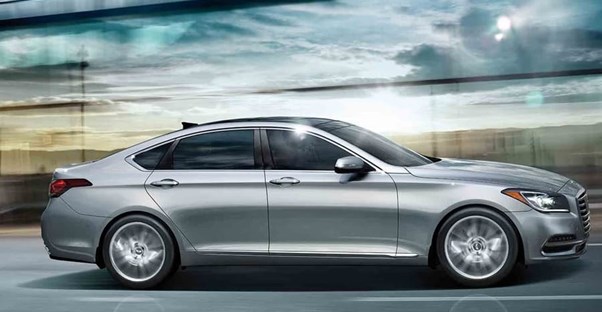 a silver 2019 genesis g80 zooming down the road
