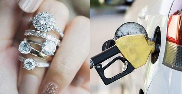 Several diamond rings on a womans finger; gas going into a car